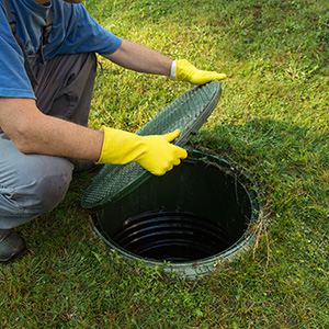plumber removing cap of sewer line berea oh
